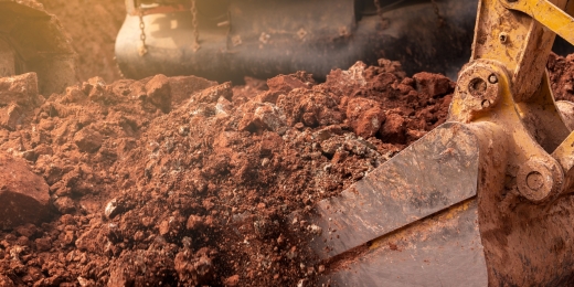 closeup-bucket-of-backhoe-digging-the-soil-at-cons-2022-11-02-18-06-20-utc