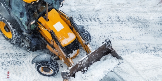tractor-loader-machine-uploading-dirty-snow-into-d-2022-09-20-23-51-38-utc